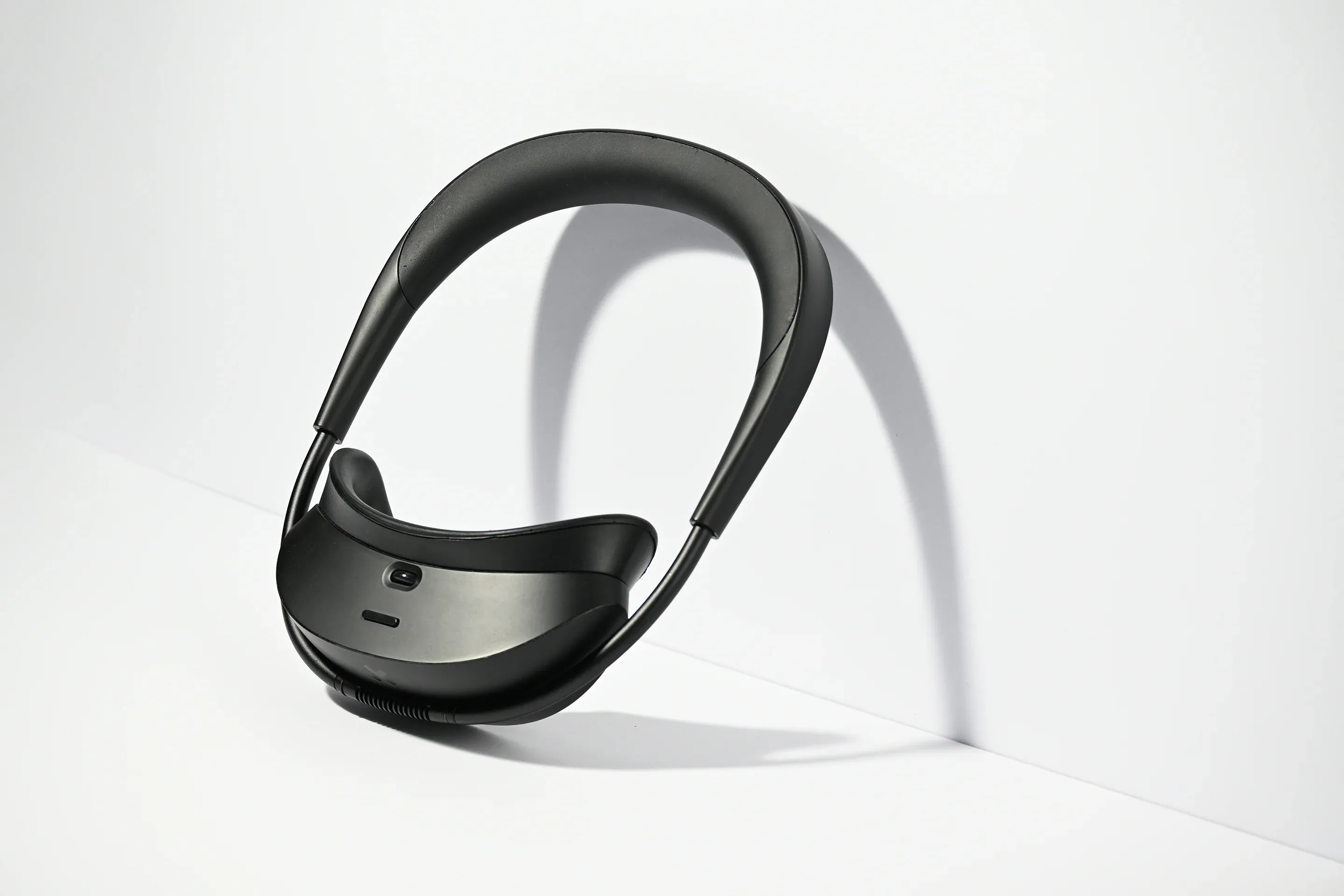 Concept render of the headset, leaning against a white wall