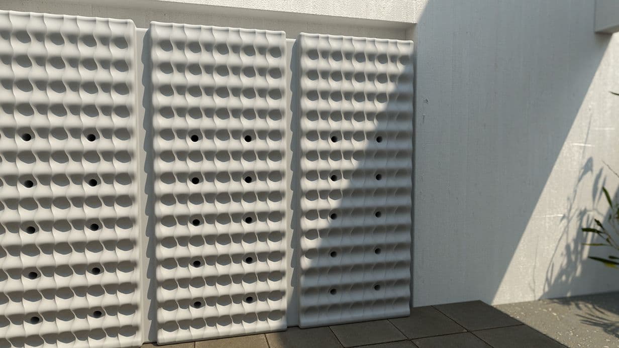 Waterwall tank fence in a courtyard