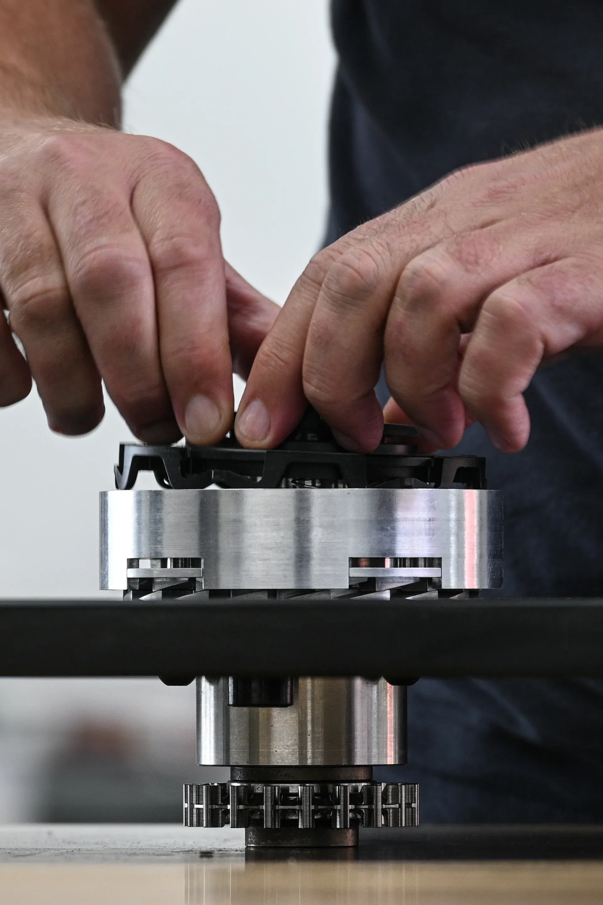 Technician assembling gears