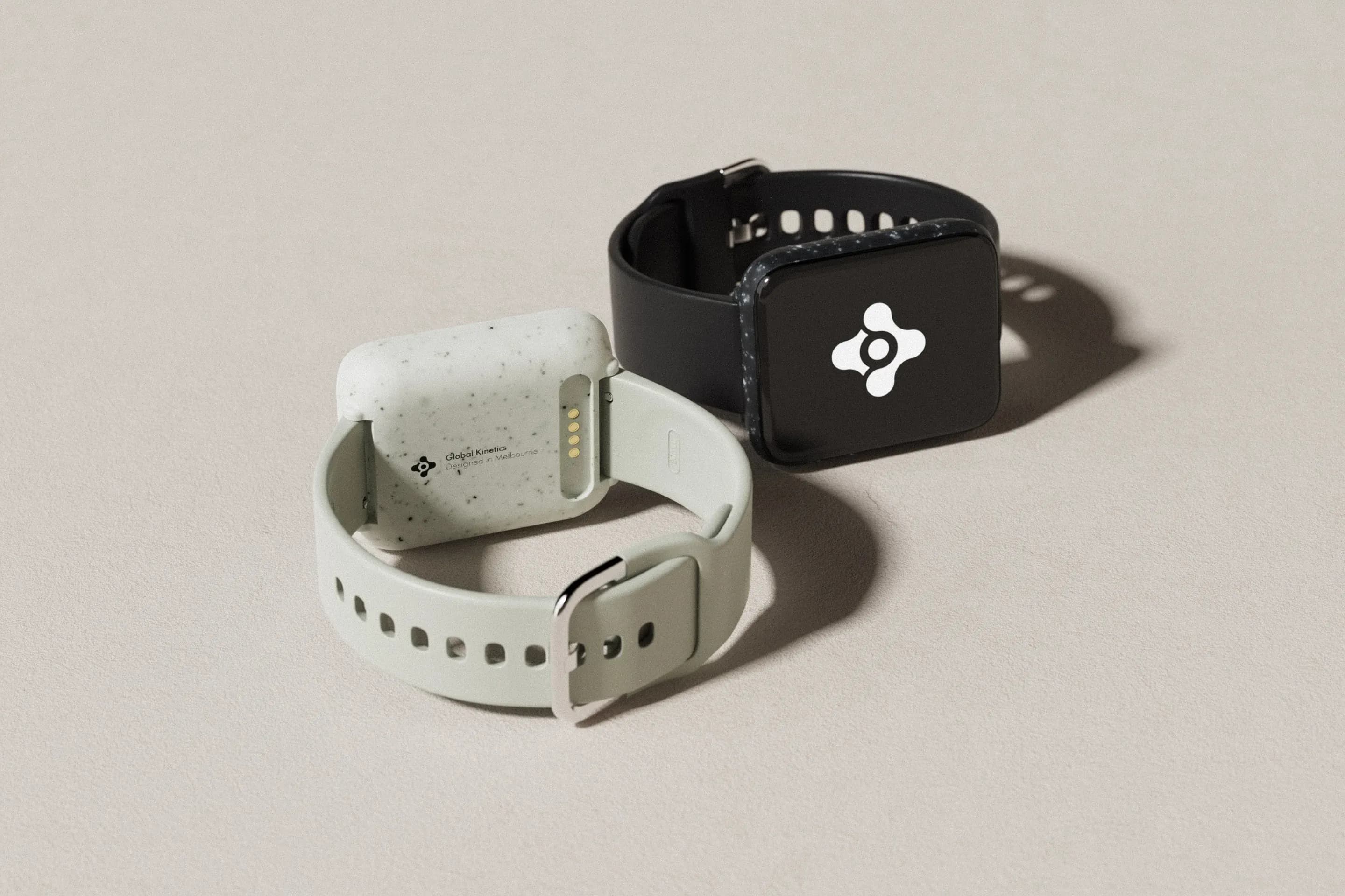 Product rendering showing the watch designs in white and black