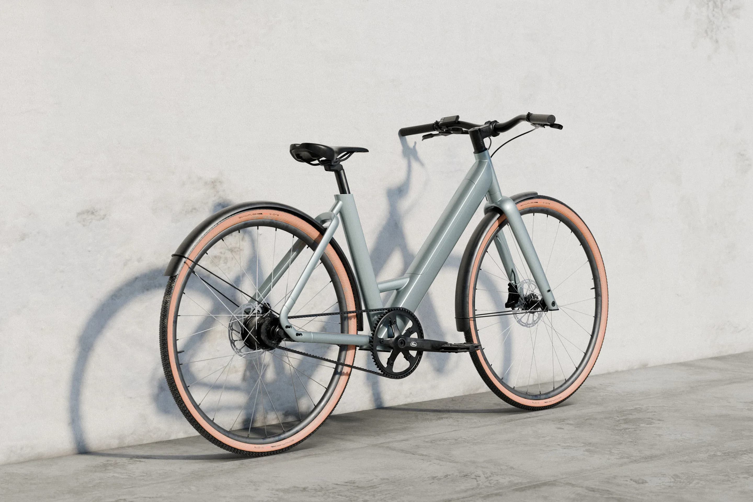 The E-bike leaning against a wall