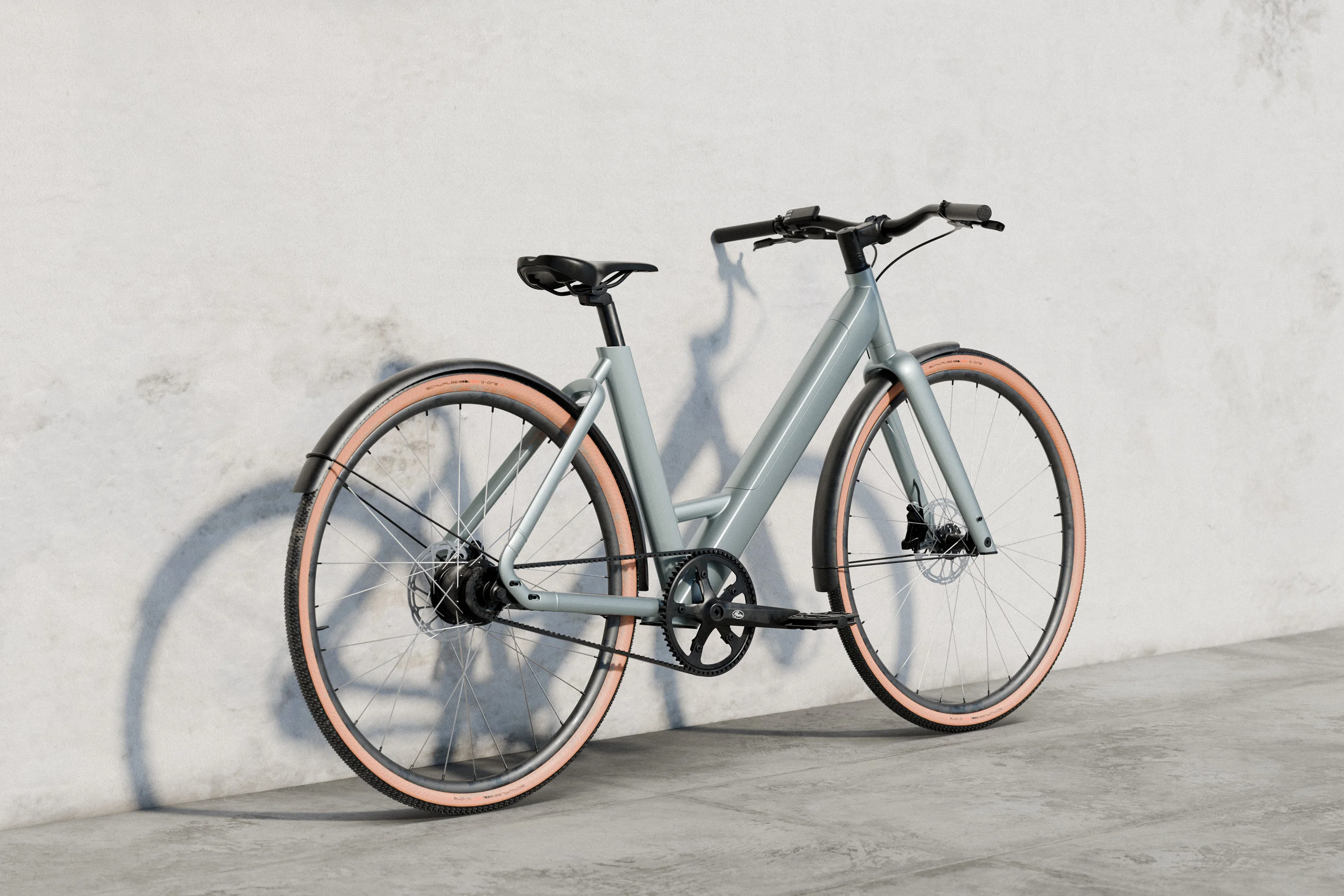 Product render of the Outerspace designed urban electric bike. Hero image of the whole bike with a light blue frame. E-bike with belt drive and step-over frame