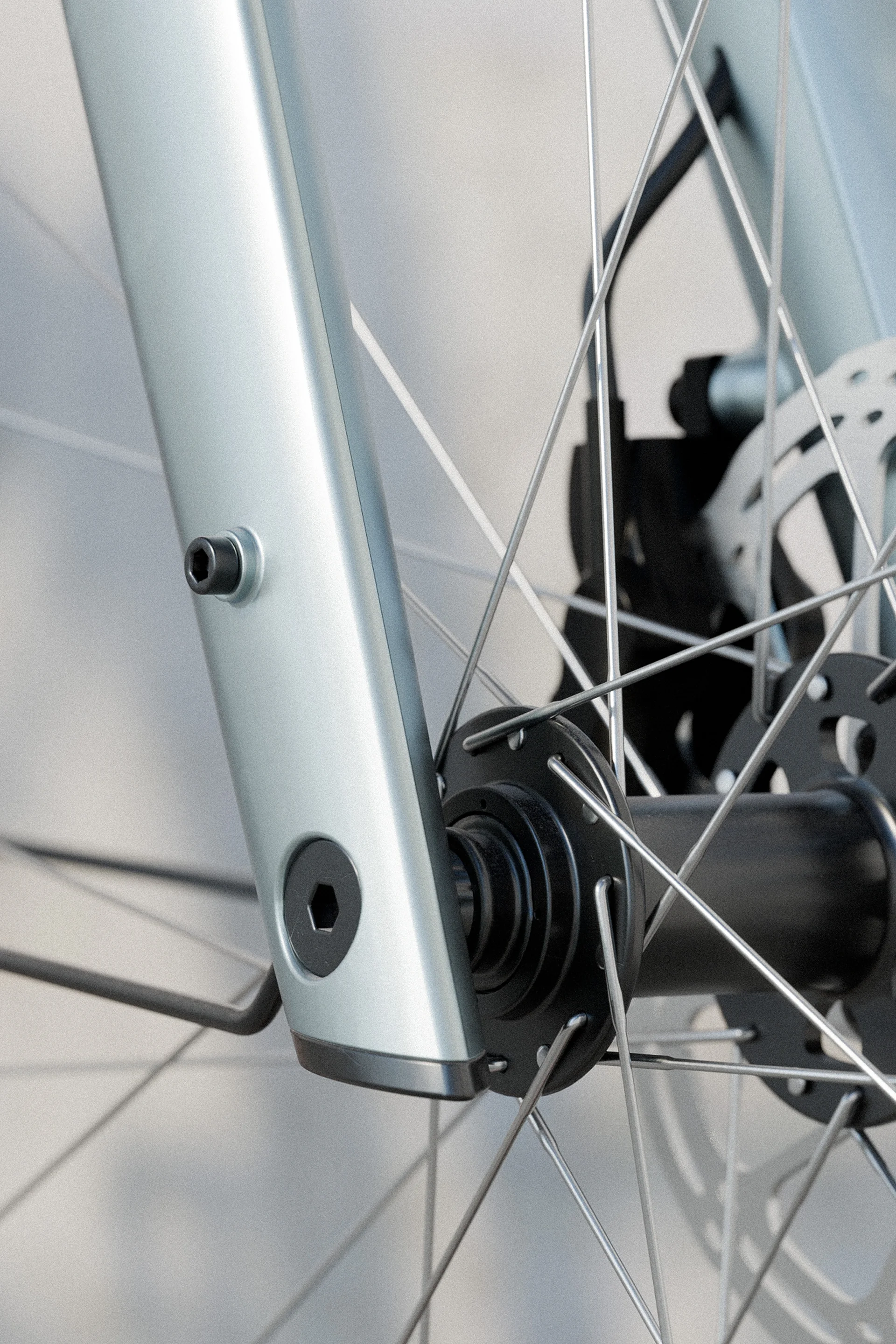 Product render of the Outerspace designed urban electric bike. Close up detail of the fork design. E-bike with belt drive and step-over frame